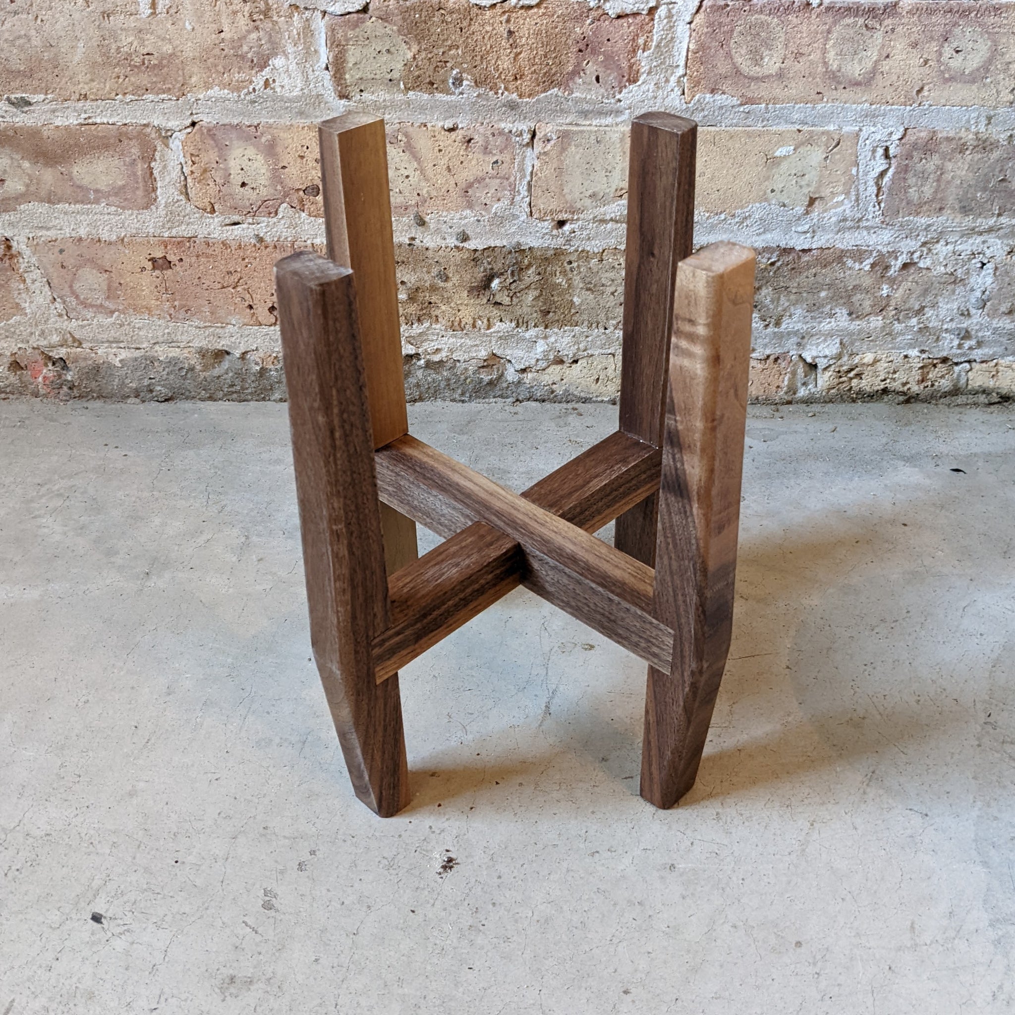 Locally made walnut plant stand for houseplants available at Rooted in Chicago.